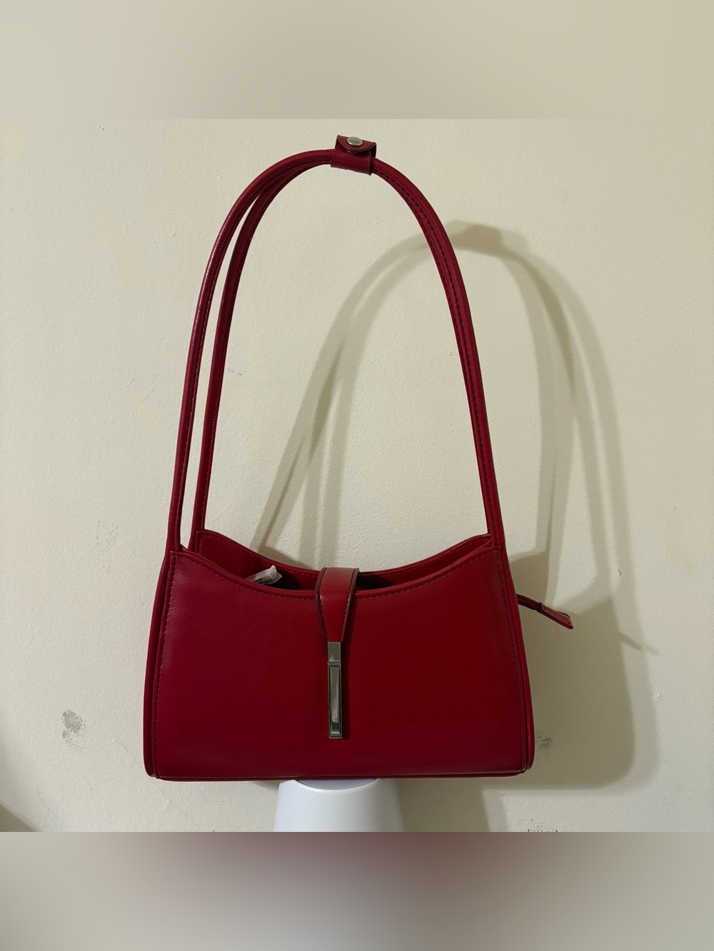 Red baguette shoulder bag